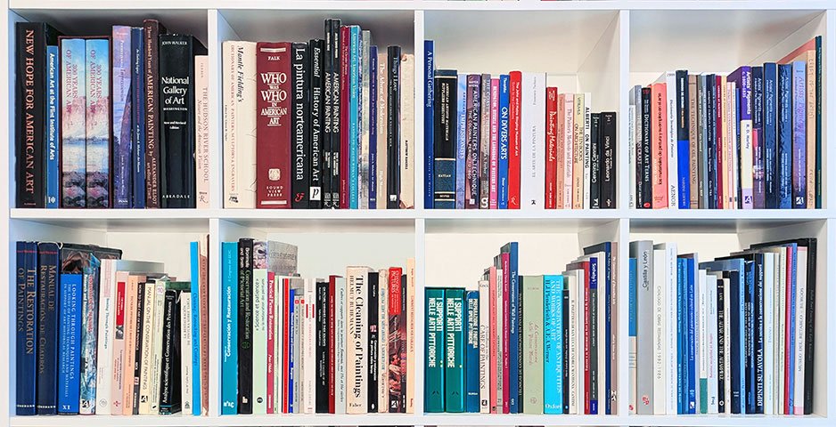A shelf full of books on art conservation