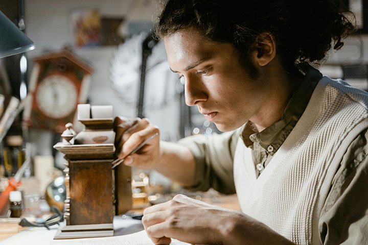 Objects conservator working on a project