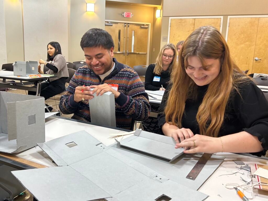 Workshop on creating archival containers for culturally sensitive materials.